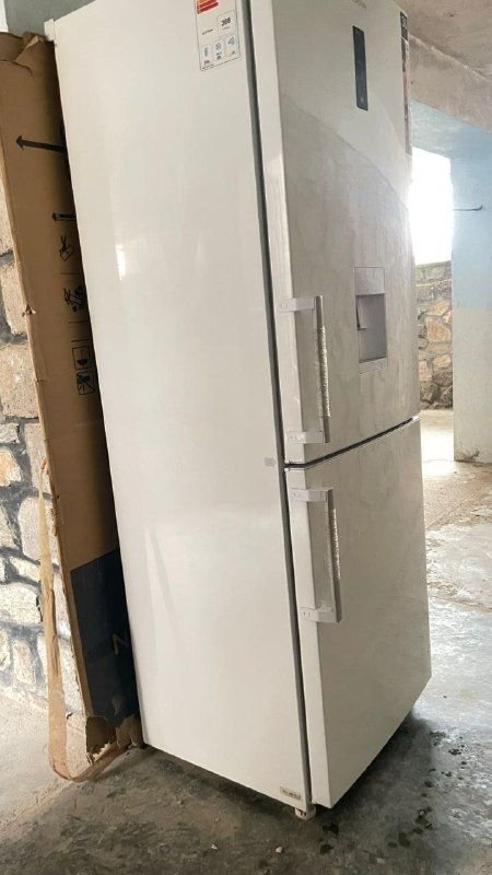 Clean Nuno refrigerator with cartons of Snowa brand