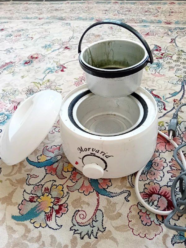 Sale of electric comb and wax machine