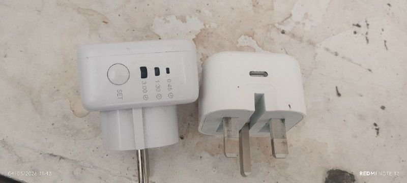 The original iPhone charger with the original timer protector with a warranty of 1000 Afghani