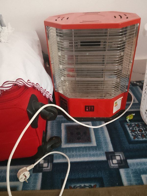 Sale of four-burner electric heater with fan, price 1000 Afghanis, contact number 0799425900