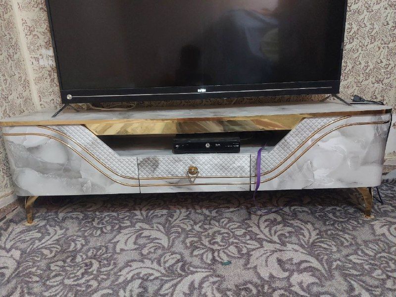 TV stand for more information, call 0792004473