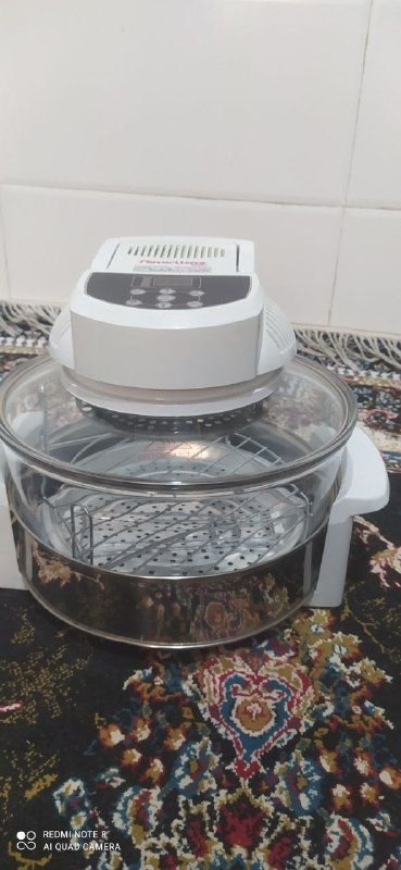 Flavor Wave turbo air cooker · Kitchen appliances · Electric cooking appliances · Steamer, slow cooker and electric air cooker. It has a height of 17 cm and a 60-minute timer. It has a capacity of 12 liters. With a steel ring to increase the capacity of the unbreakable pyrex container.